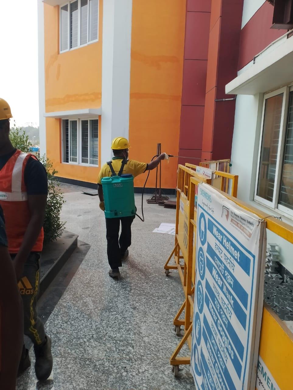 Strive International technician carrying out pest treatment around a commercial building